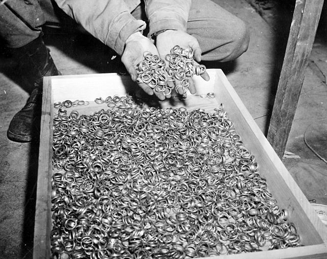 US troops, while liberating Buchenwald concentration camp in 1945, found thousands of wedding rings that had been taken from victims during The Holoca