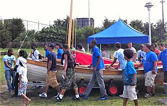 The 2011 class of Rocking the Boat launches the boat they built, "The Legacy". Rocking the Boat Launches The Legacy.jpg