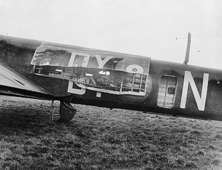 The damaged port-side fuselage of Whitley Mk V P5005 'DY-N', of No. 102 Squadron, after returning from a bombing raid to the Ruhr on the night of 12/13 November 1940. It was hit by German anti-aircraft fire