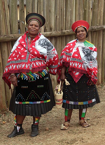 Married Zulu women wearing headdresses at annual Reed Dance ceremony.