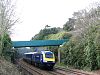 First Great Western 43185 with a train for London Paddingotn passed under Network Rail's prototype plastic footbridge which was installed to replace an old iron structure in 2008