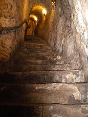 Stairs cut into solid rock in an underground Wine Cave in Aranda de Duero, Spain.