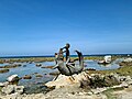 Statue of Lam-ang wrestling a crocodile at Kapurpurawan Rock formation