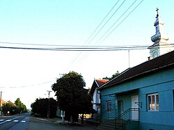 Straža, main street and Romanian Orthodox church.jpg