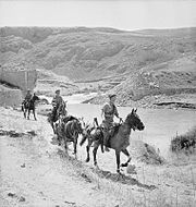 The Cheshire Yeomanry patrolling on horseback at Marjuyan in Syria, 16 June 1941