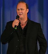 Tim McInnerny guest stars as JIC chairman Oliver Mace in three episodes. Tim McInnerny.jpg