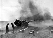 US Army field gun in action