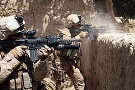 US Marines firing M4s in Helmand province Afghanistan.jpg