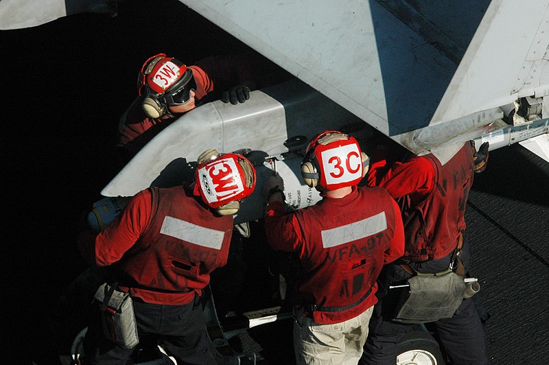 File:US Navy 091207-N-3327M-120 Sailors load ordnance onto an F-A-18C Hornet assigned to the Warhawks of Strike Fighter Squadron (VFA) 97 aboard the aircraft carrier USS Nimitz (CVN 68).jpg