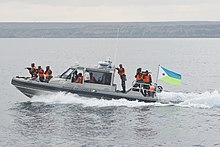 Defiant class patrol boat of Djibouti Ugandan service members prepare to board a target vessel during exercise Cutlass Express 2013 in the Gulf of Tadjoura off the coast of Djibouti Nov. 14, 2013 131114-F-NJ596-095.jpg