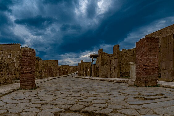 The beginning of the Via dell'Abbondanza in Pompeii at the end of the day