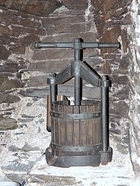 A wine press is used to squeeze the juice out of grapes.