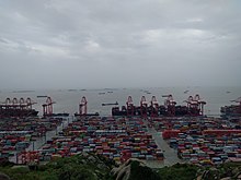 The Port of Shanghai's deep water harbor on Yangshan Island in the Hangzhou Bay is the world's busiest container port since 2010. Yangshan Port 20170923-3.jpg