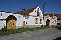 English: Čejetice, a village in Strakonice district, Czech Republic, a houses on the village common. Čeština: Čejetice, okres Strakonice, domy na návsi