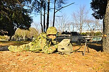 A JGSDF soldier with a Sumitomo Minimi. Fitted is a blank-firing barrel. 5.56mmJi Guan Chong MINIMI.jpg