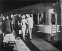 Passengers boarding the streamline 20th Century train