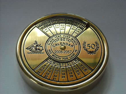 A 50-year "pocket calendar" that is adjusted by turning the dial to place the name of the month under the current year. One can then deduce the day of the week or the date.