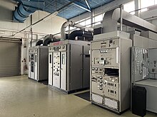 Multiple senders (radio transmitters) were housed in a large hall at BBC Far Eastern Relay station BBC Kranji transmitter hall 3.jpg