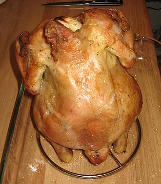 Beer can chicken cooked by indirect grilling. Beer can chicken.jpg
