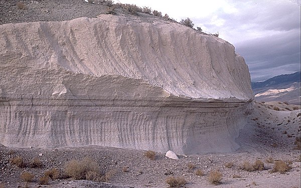 Layers of the Bishop tuff, in a rock quarry in Chalfant Valley, about 25 km (16 mi) southwest of the Long Valley Caldera, laid down in phases of a maj