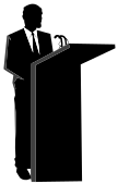 Silhouette of a businessman speaking from a podium