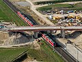 * Nomination S-Bahn train Alstom Coradia Continental at the newly built road bridge in Buttenheim, direction Nuremberg --Ermell 05:48, 23 June 2023 (UTC) * Promotion  Support Good quality. --Radomianin 06:58, 23 June 2023 (UTC)