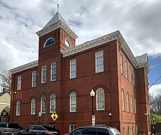 The Corcoran School has housed the Embassy of Qatar's Defense Attache Office since 2016. Corcoran School Georgetown.jpg