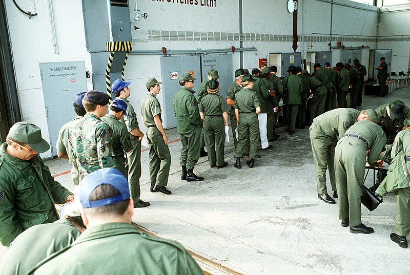 File:DF-ST-83-07412 Air Force personnel wait in an in-processing line at Leck Air Base to begin their participation in Reforger 82.jpeg