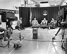 Deke Slayton (on stool at left) and the Apollo 11 crew during the last pre-flight press conference