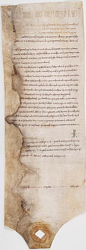 Diplôme en latin de 1111 par lequel le 
roi Louis VI, après avoir fait prisonnier le seigneur du Puiset, fait raser son château et abolit les coutumes établies par ce seigneur sur les terres de l'abbaye de Saint-Denis, Archives nationales.