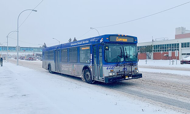 Edmonton Transit Service New Flyer D40LF on a route 110X service to Eaux Claires at 106 Street