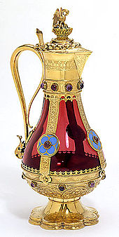 Flagon, ruby glass, silver-gilt mounts, stones and enamels, 1858-9, John Hardman Powell, V&A Museum no. M.39-1972 Flagon.jpg