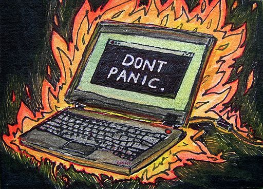 Flaming computer - "don't panic" (4549185468)