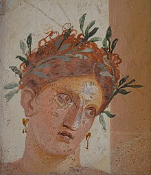 Fresco showing a woman's face from Herculaneum, she is wearing a garland of olives, probably from a sacrifice scene, Naples National Archaeological Museum (14840101424).jpg