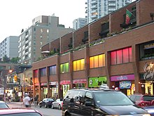 The first decade of the 21st century saw a number of privately owned businesses close in Church and Wellesley, with larger corporations taking their place. Gay Toronto View Down Church Street.jpg