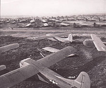 During Operation Market-Garden, Waco gliders are lined up on an English airfield in preparation for the next lift to the Netherlands.