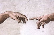 Hand of God reaching out to Adam who receives it