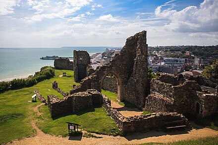 Hastings Castle, with the Pier and Town Centre in the background, and Eastbourne on the horizon