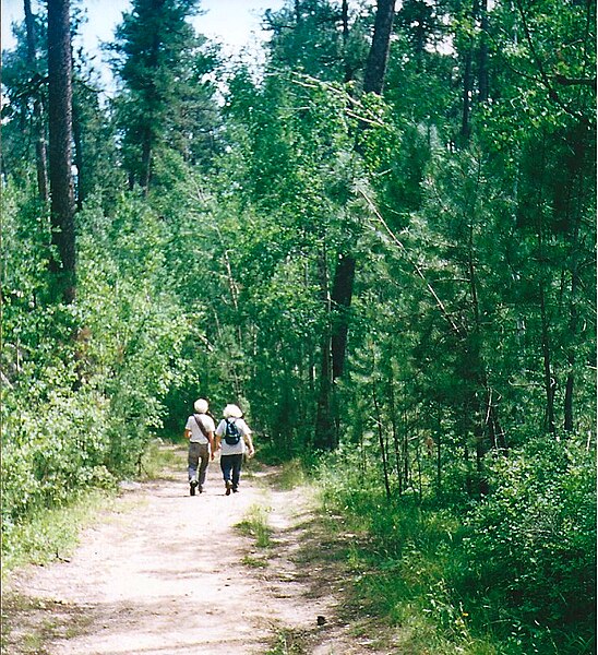 File:Herb and Jan Conn return from climbing.jpg
