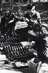 Guerrillas assemble shells and rockets delivered along the Ho Chi Minh Trail. HoChiMinhTrail003.jpg