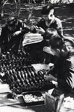 Guerillas assemble shells and rockets delivered along the Ho Chi Minh Trail. HoChiMinhTrail003.jpg