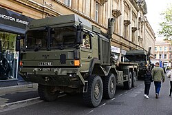 A MAN SV flatbed truck on display at the 2024 Freedom of the City military parade in Queen Victoria Square, Kingston upon Hull.