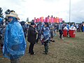 The "Strawberry fields" section of the Isle of Wight Festival 2011, seen during light rain with numerous people wearing ponchos. I thought it would be a good idea to take a photo as it has never really rained at the Isle of Wight Festival before, however this was nothing compared to the heavy rain that later occured on Sunday.