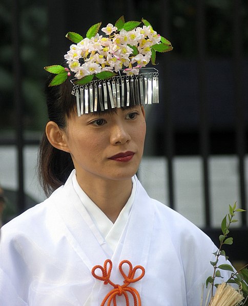 A Japanese Brazilian miko during a festival in Curitiba.