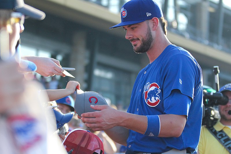 File:Kris Bryant signing autographs during his rehab assignment against Omaha (42507322120).jpg