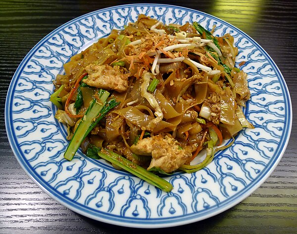 Wide shahe fen stir-fried with soy sauce, as served in Switzerland