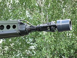 Надульное устройство пушки MK 30-2/ABM с датчиками-соленоидами начальной скорости и программатором взрывателей снарядов типа АВМ в составе комплекса вооружения БМП «Пума» первой серии, 2015.