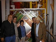 One of the first experiments with Micromegas detectors: COMPASS. On this 2001 pictures, we see Georges Charpak and the COMPASS Saclay team in front of the large Micromegas chambers. Magnon.jpg