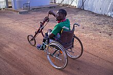 A Ghana man in wheelchair Man in a WheelChair.jpg