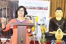 Manjula Pradeep addresses a crowd.jpg